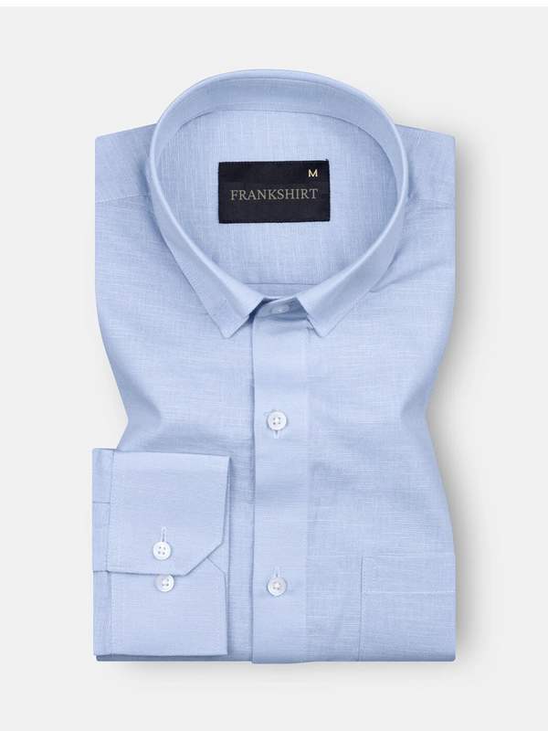 A sky blue, long-sleeved, button-down linen shirt by Frankshirt displayed against a white background.