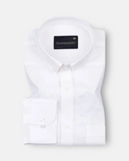 A white, long-sleeved, button-down linen shirt by Frankshirt laid out flat on a plain background.