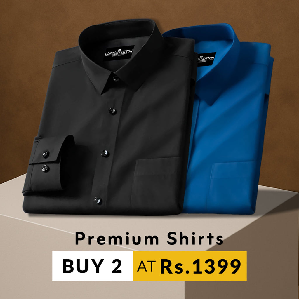 Two folded shirts, one black and one blue, on a brown background with promotional text.