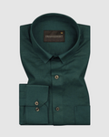 A bottle green linen shirt with a button-down collar, button-up front, and long sleeves, laid flat on a plain background.
