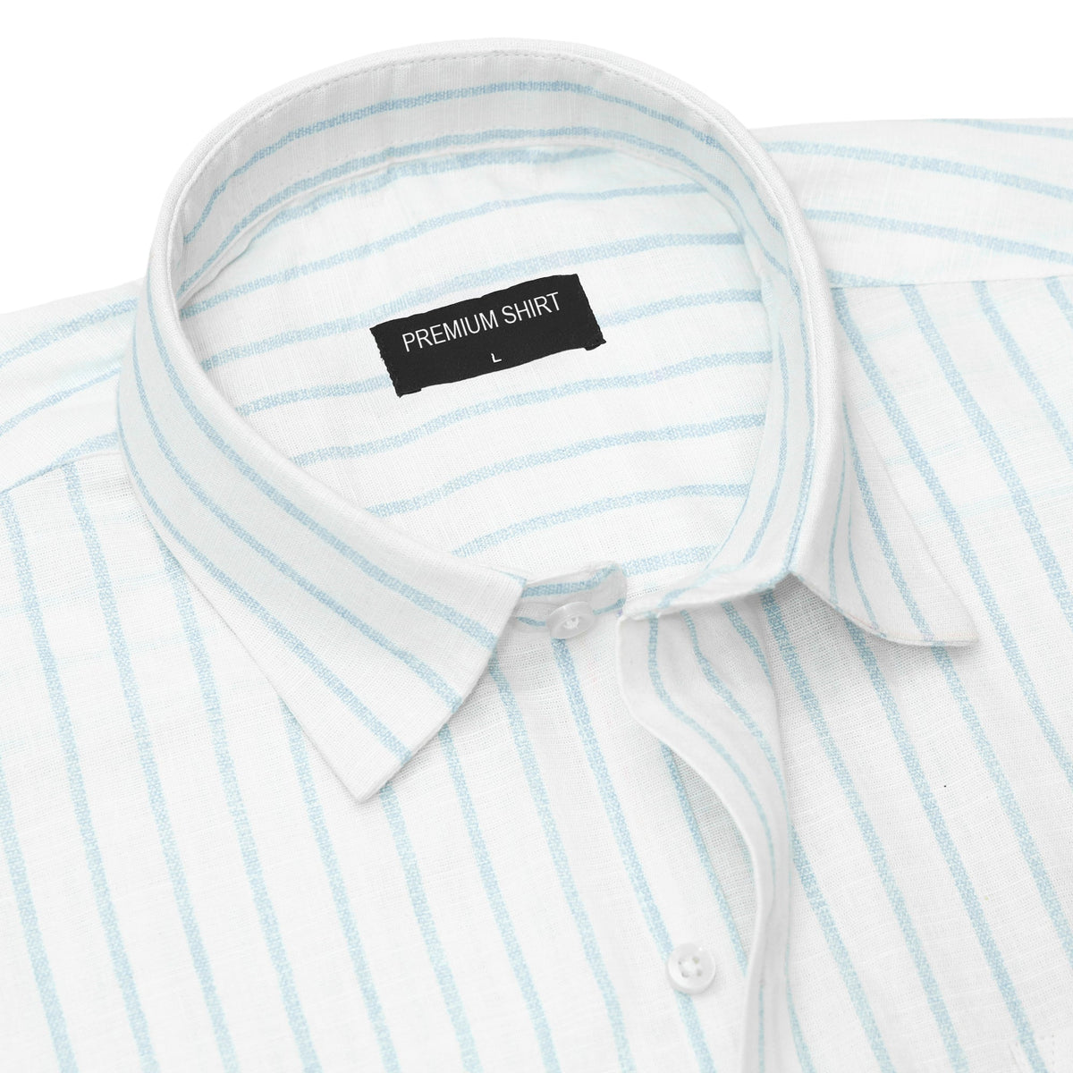 Close-up of a white shirt with blue stripes and a visible label on a white background
