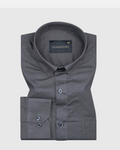 A dark grey, long-sleeved, button-down linen shirt by Frankshirt displayed against a white background.