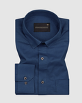 A navy blue, long-sleeved, button-down linen shirt by Frankshirt displayed on a white background.