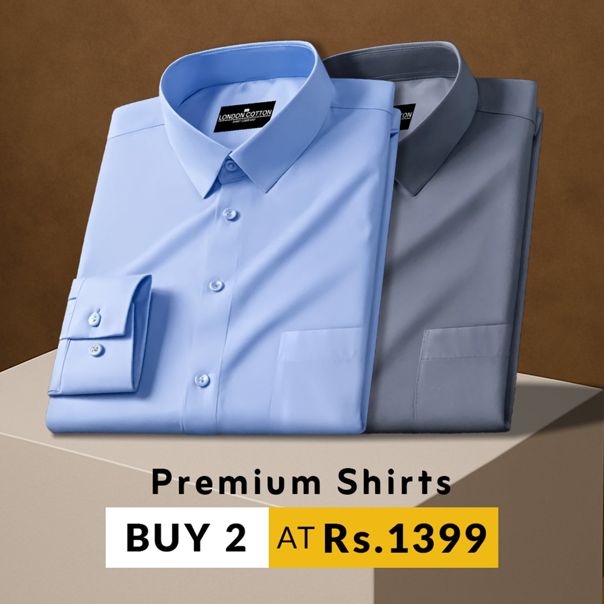 Two folded shirts, one blue and one gray, on a brown background with promotional text.