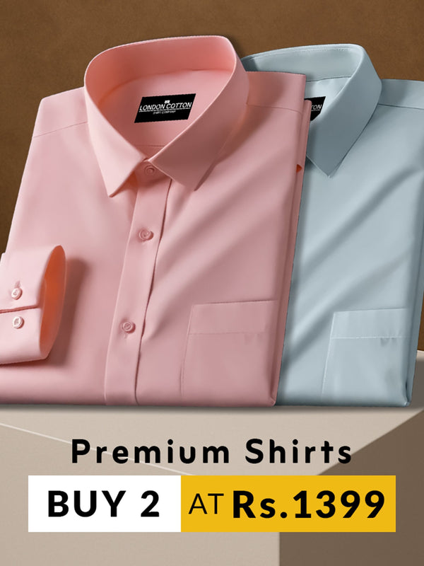 Two folded premium shirts, one pink and one light blue, on a brown background with promotional text.