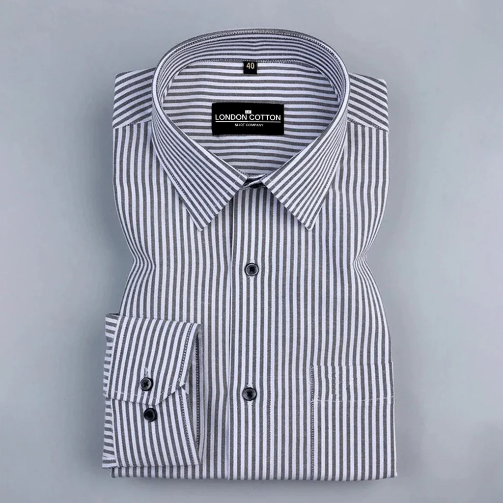 Folded black and white striped shirt with 'London Cotton' label on a gray background