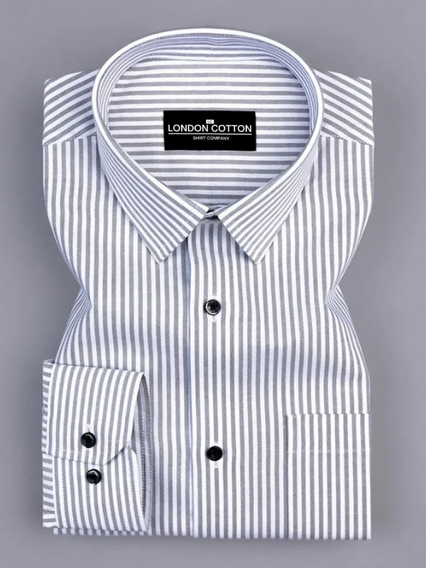 Folded white shirt with blue stripes on a gray background