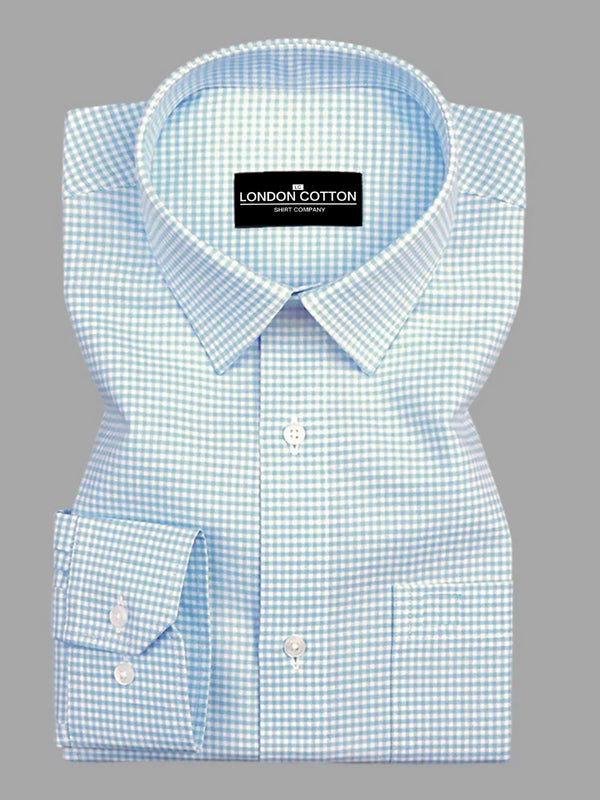 Blue checkered shirt with 'London Cotton' label on a gray background
