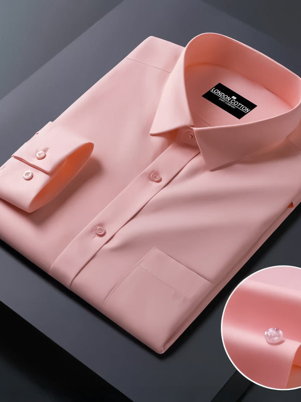 Pink dress shirt with a close-up of the collar on a dark background